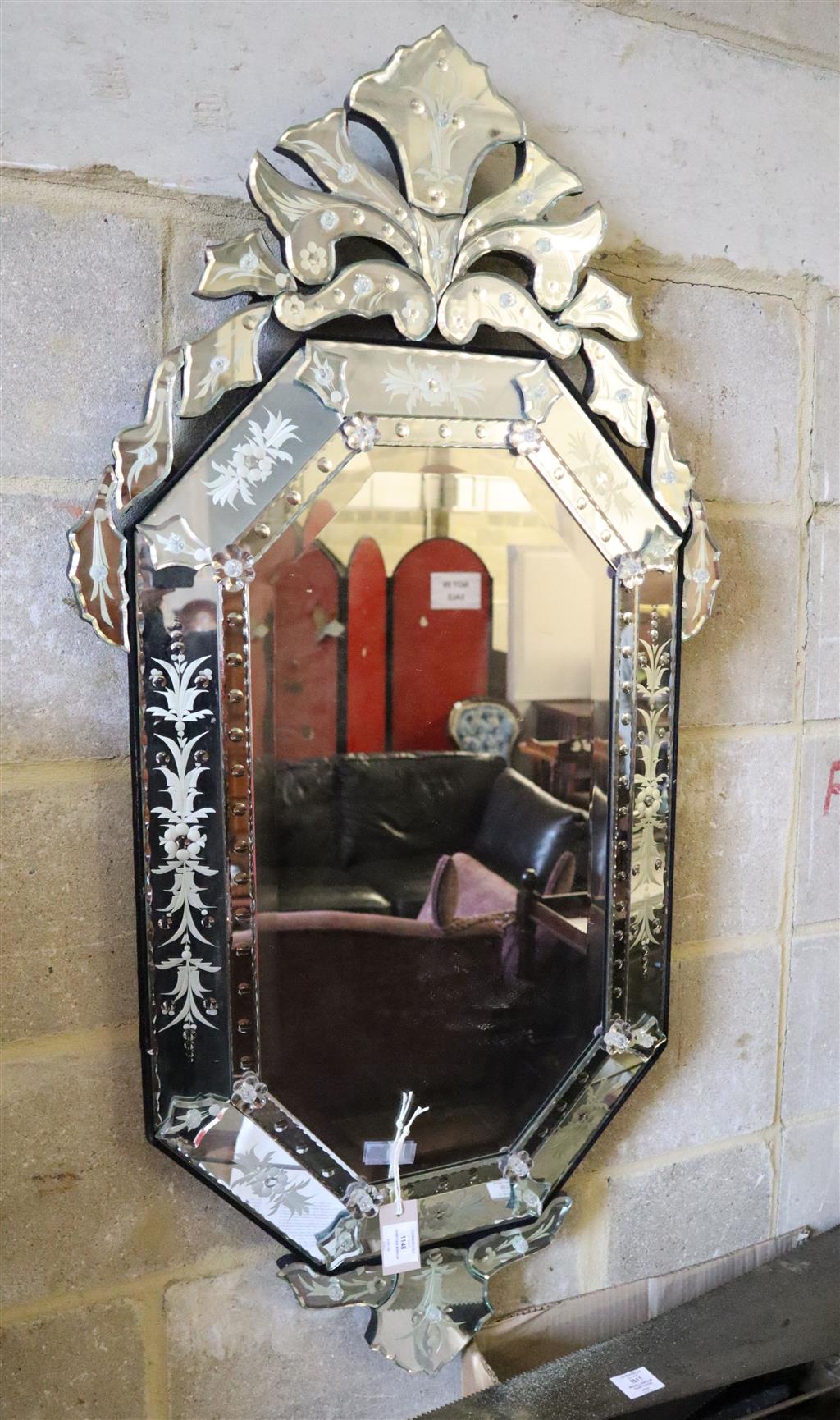 A Venetian octagonal wall mirror, width 60cm, height 120cm